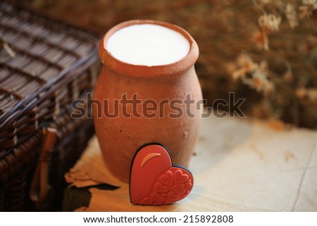 old clay jug of milk, dry food health daisy flowers book heart love romantic Valentine breakfast
