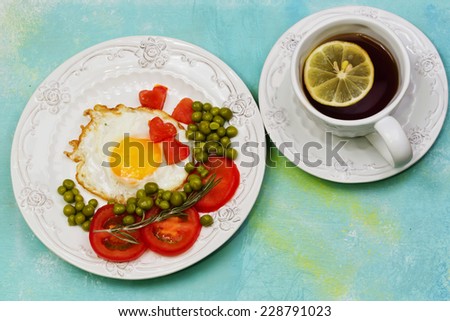scrambled eggs with tomato and green peas lemon tea morning breakfast health diet