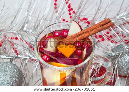 Hot punch apple cider cinnamon drink berries winter christmas selective soft focus toned photo