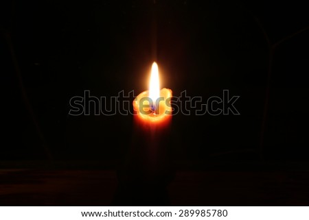 Burning candle in the dark fire mystic romance