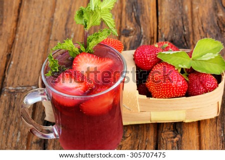 Home strawberry lemonade nonalcoholic drink mint old wooden background