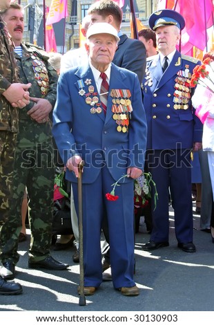KIEV, UKRAINE - MAY 9: War veterans at ceremonial parade at Kiev main street - Khreshchatyc - dedicated to the 64th Anniversary of victory in Great Patriotic War (World War II) May 9, 2009 in Kiev.