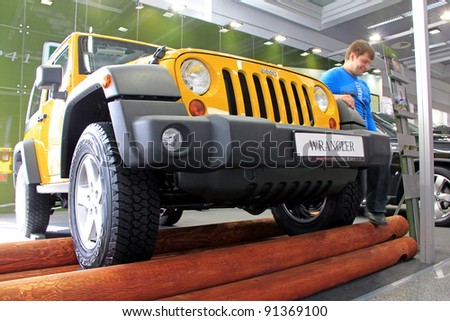 KIEV - SEPTEMBER 10: Yellow Jeep Wrangler at yearly automotive-show \