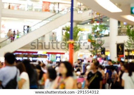 blurred people in department store