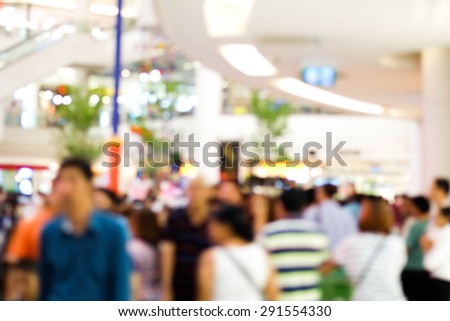 blurred people in department store