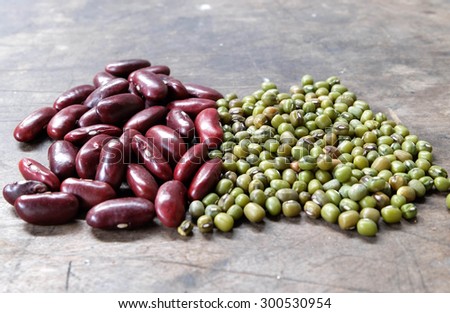 green beans and kidney beans on wood