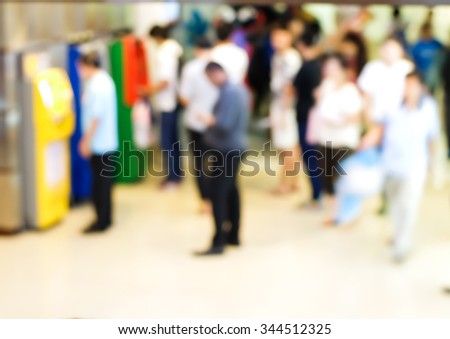 Abstract Blurry people with automatic teller machine or ATM