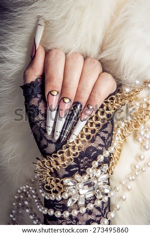 Retro gold and pearl jewels and extreme long nails. Gatsby, Vintage style