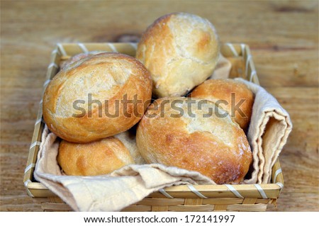 French Dinner rolls in the basket on the table