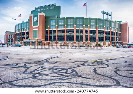 Green Bay, Wisconsin - December 2, 2014: Lambeau Field home of the Green Bay Packers with an empty parking lot except for visitors.