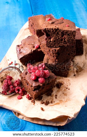 chocolate brownie with the frozen raspberry