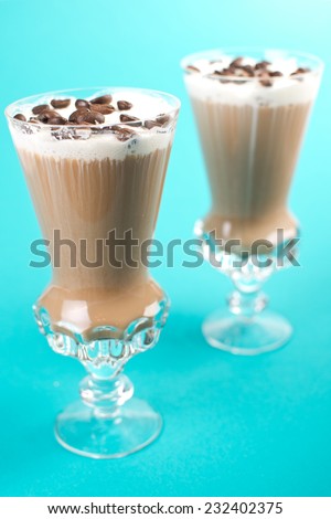 latte coffee with cream and coffee grains