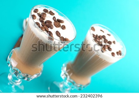 latte coffee with cream and coffee grains