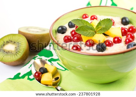 Oat porridge from porridge with berries  isolated on a white background