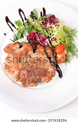 fried meat stake with vegetables