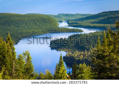 The beautiful Wapizagonke Lake at sunset viewed from the lookout Le passage, La Mauricie National Park, Quebec, Canada