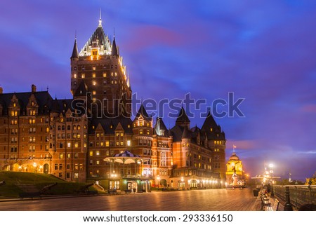 View of the Frontenac Castle and Dufferin Terrace at twilight, Quebec City, Quebec, Canada. The castle is a grand hotel and the most famous landmark of Quebec City.