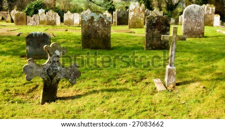 old irish grave yard with lots of tomb stones