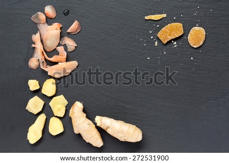 Selection of different stages of ginger from whole root to marinated and candy. Shallow DOF