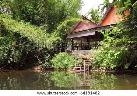 wooden cottage on the lake