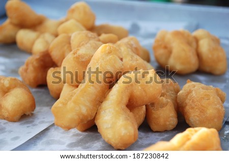Deep - fried dough stick. a kind of Chinese flour sweetmeat