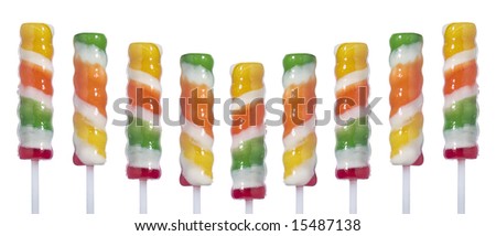 Nine lollipop sticks on a V shape isolated over white background.