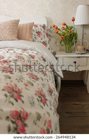 Shabby chic bedroom with flower patterns