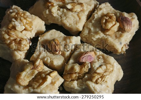 Sheer Payra is traditional Afghan fudge flavored with cardamom, pistachios and walnuts