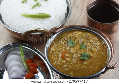 Mixed lentils cooked with fresh Indian spices and served with rice