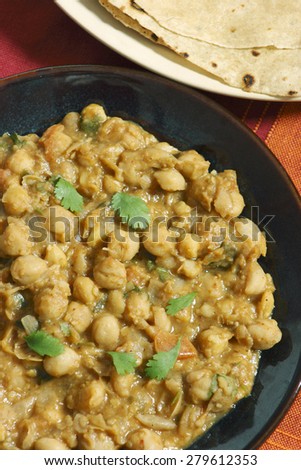 Chana dal cooked in fresh indian spices served with Roti