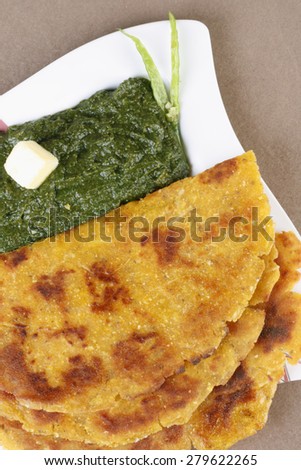 Paratha - flat bread from India served with mint chutney