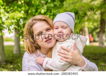 Mother calms a crying baby on your hands