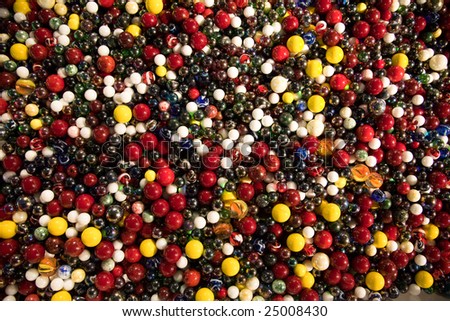 Large group of childrens glass playing marbles