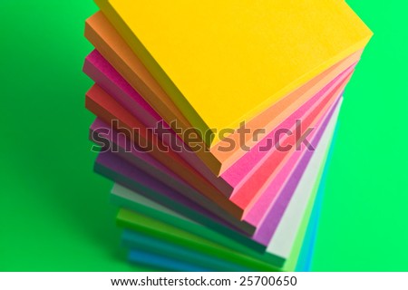 Stack of sticky note paper pads