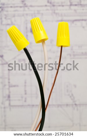 Electrical wire with blurred blueprint background