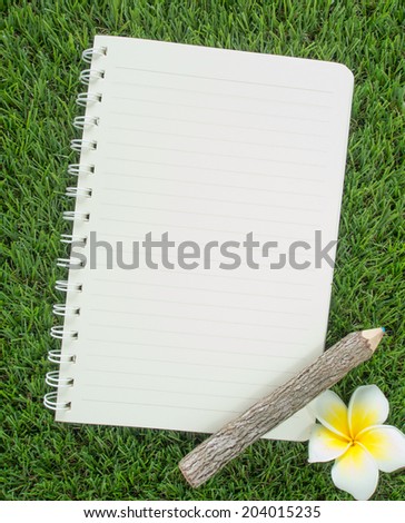 Notebook lay on the lawn