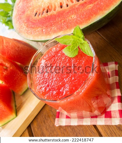 Fresh watermelon and glass of watermelon smoothie