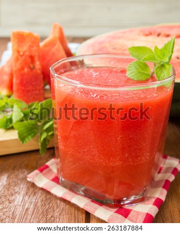 Fresh watermelon and glass of watermelon smoothie