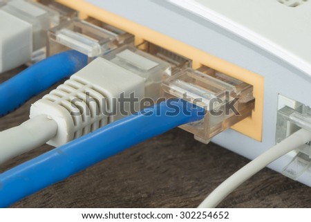 Plug the LAN cable socket for connection to the Internet.