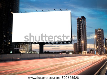 Advertising concept, Blank template  for outdoor advertising or blank billboard on the highway during the twilight. With clipping path on screen - can be used for trade shows, promotional poster.