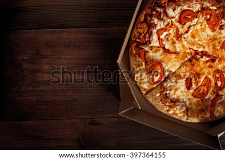 pizza in the in delivery box you can put your writing on the wood