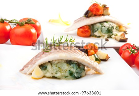 Fish filet on potato with chard