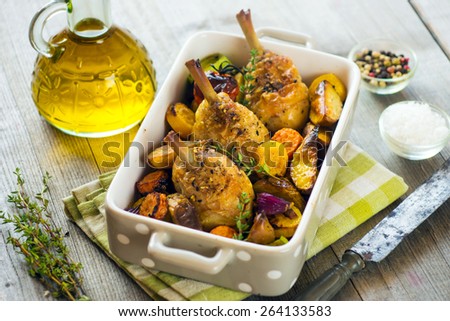 Crispy Baked Chicken Leg with vegetables and herbs