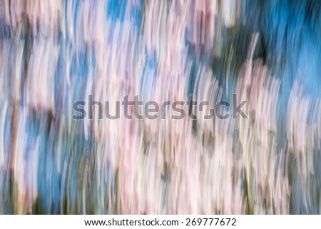 Abstract colorful blur background with blue lilac pink coral texture \
Artistic conceptual creative style. Blurred image for minimalist, puristic design effect, organic vertical lines pattern