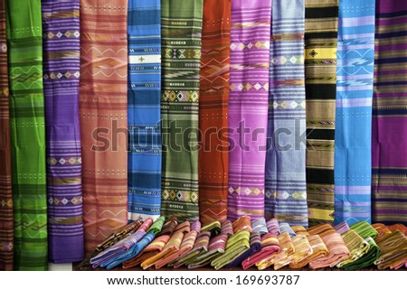 Thai silk made from pure natural silk thread and dyed by chemical colours with old style original tradition knowledge patterns designed.