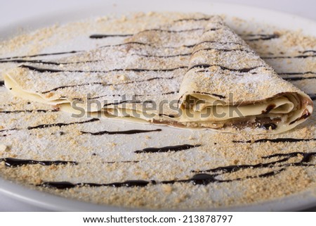 Pancake with chocolate cream and coconut