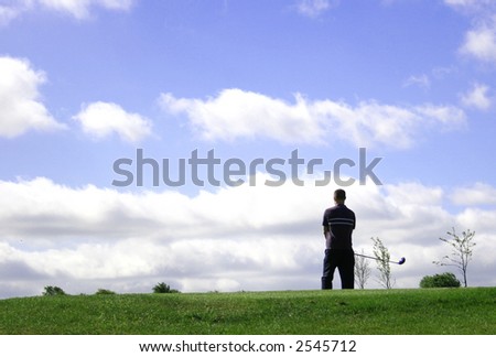 A junior golf champion looks for the green