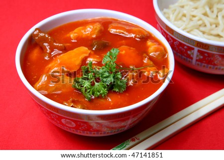 A tasty meal of sweet and sour pork with rice