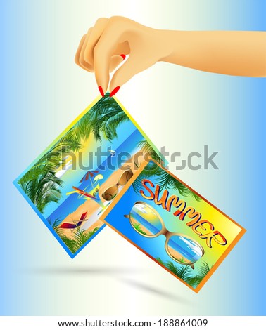 Cards in hand with summer sea beach scenery and recreation