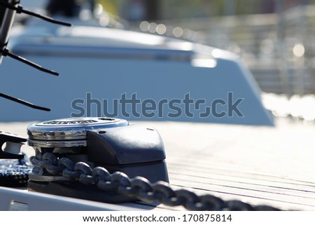 Anchor chain on deck of small sailing boat.